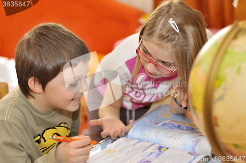 Image of kids doing some homework
