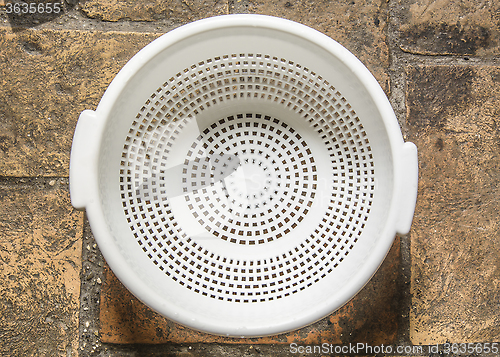 Image of White plastic colander