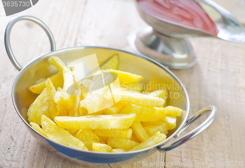 Image of potato with tomato sauce