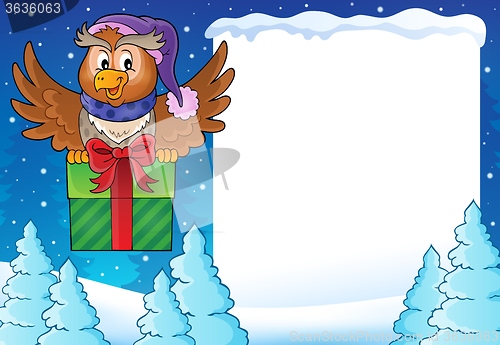 Image of Snowy frame with owl and gift