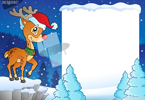 Image of Snowy frame with Christmas reindeer