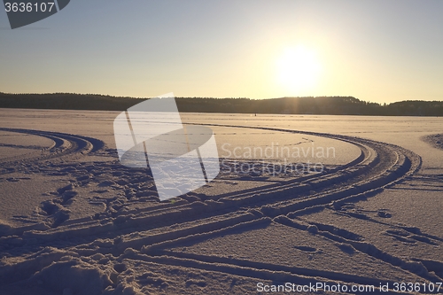 Image of Frozen lake sunset