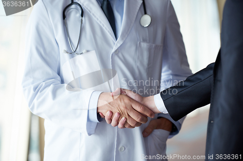 Image of doctor handshake with a patient