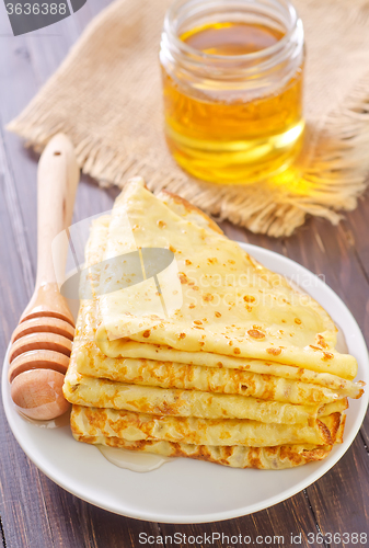 Image of pancakes with honey