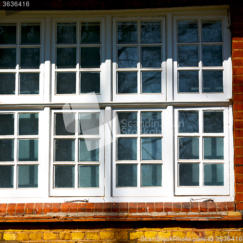 Image of old windon in england london brick and glass the wall 