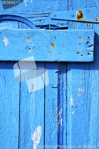 Image of rusty metal     nail dirty stripped paint in the  and morocco kn