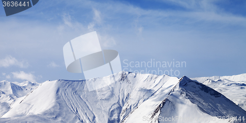 Image of Panoramic view on snowy mountains with avalanches