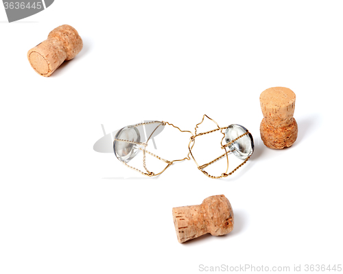 Image of Three corks from champagne wine and muselets