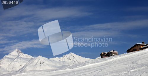 Image of Panoramic view on ski slope and hotels in winter mountains