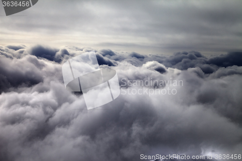Image of Top of off-piste slope in storm clouds