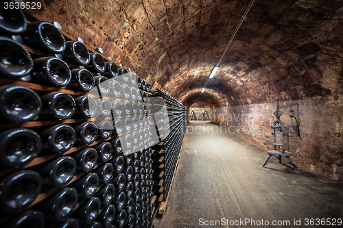 Image of Long underground brick tunnel in the wine cellar