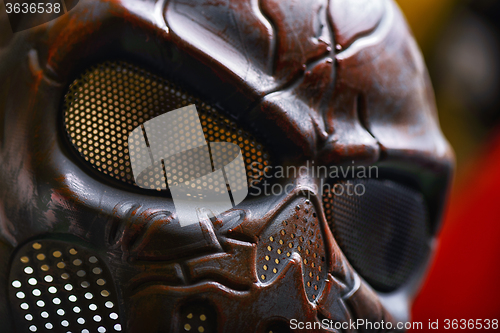 Image of Steel mask covered with rust closeup