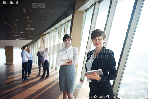 Image of business people group, females as team leaders