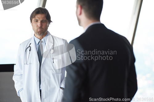 Image of doctor handshake with a patient