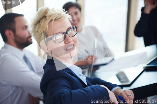 Image of blonde business woman on meeting