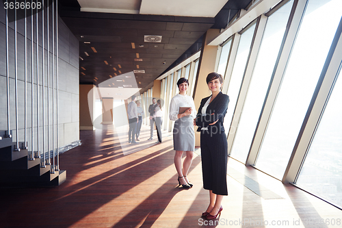 Image of business people group, females as team leaders