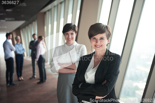 Image of business people group, females as team leaders