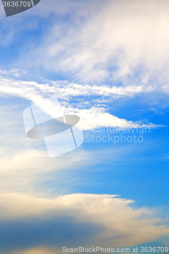 Image of in the blue sky white soft clouds and abstract background
