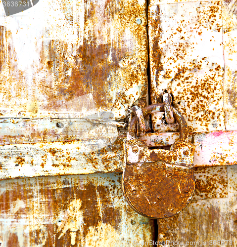 Image of rusty  brown    morocco in africa the old wood  facade home and 