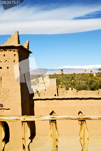 Image of brown old  construction in  terrace   near the tower