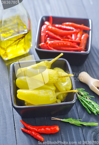 Image of chilli peppers and peppercini