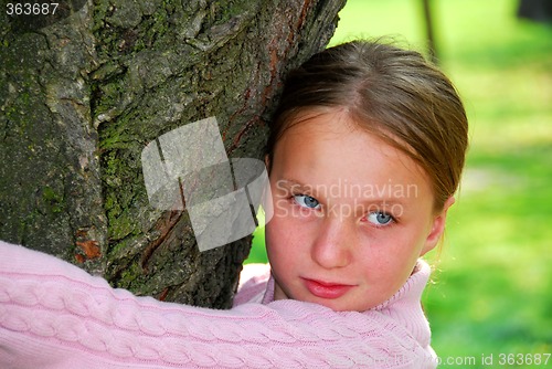 Image of Girl and big tree