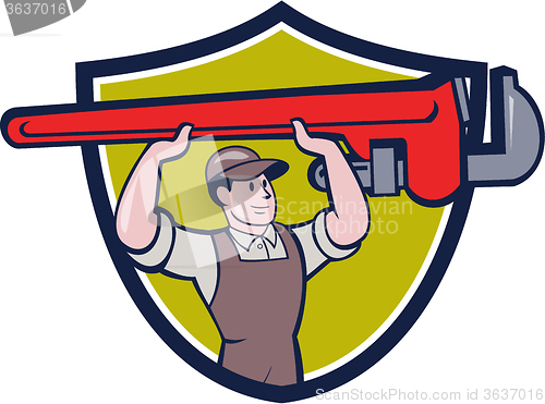 Image of Plumber Lifting Monkey Wrench Crest Cartoon