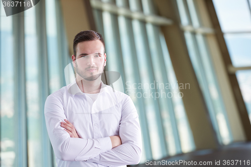 Image of business man with beard at modern office