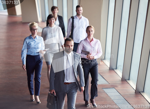 Image of business people group walking