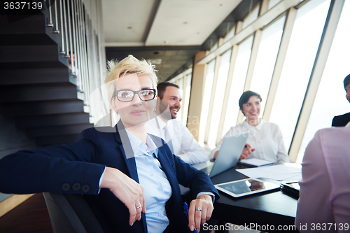 Image of blonde business woman on meeting