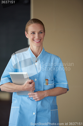 Image of female doctor with tablet computer