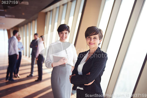 Image of business people group, females as team leaders