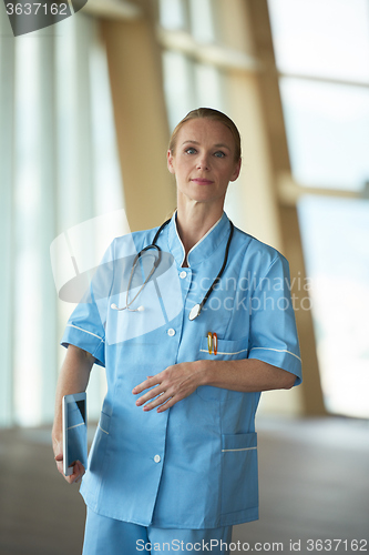 Image of female doctor with tablet computer