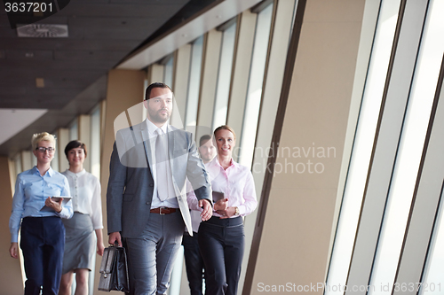 Image of business people group walking