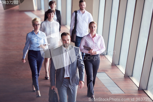 Image of business people group walking