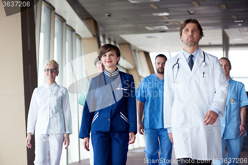 Image of doctors team walking