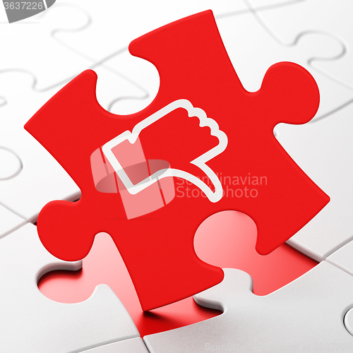 Image of Social media concept: Thumb Down on puzzle background