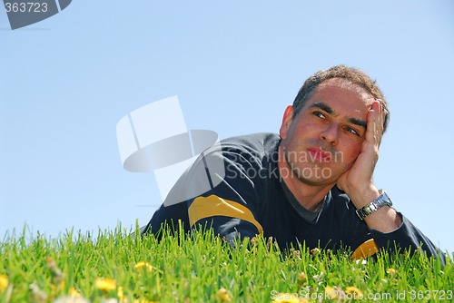 Image of Man grass sky