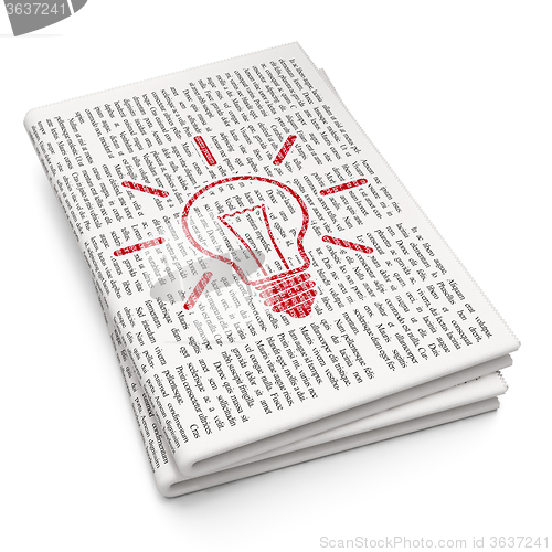 Image of Business concept: Light Bulb on Newspaper background