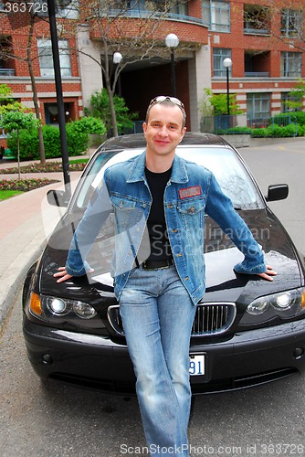 Image of Man and his car