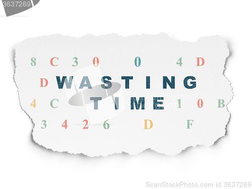 Image of Time concept: Wasting Time on Torn Paper background