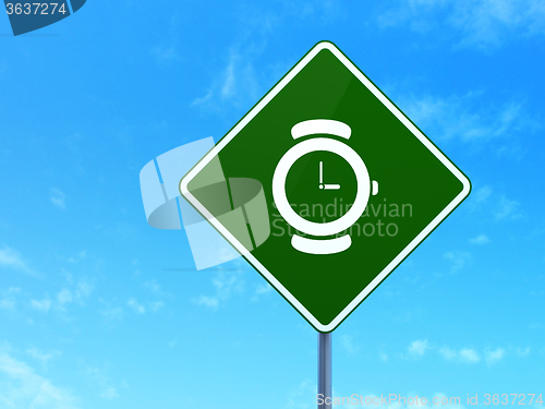 Image of Timeline concept: Watch on road sign background