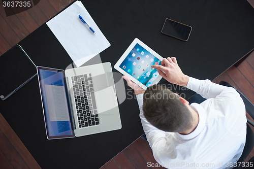 Image of top view of young business man at office