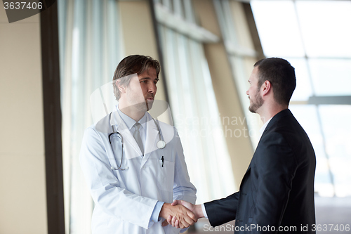 Image of doctor handshake with a patient