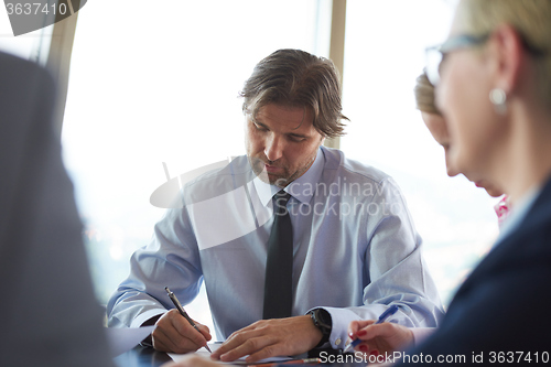 Image of business people group on meeting at office