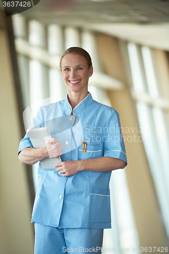 Image of female doctor with tablet computer
