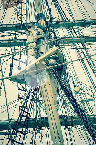 Image of Mast and sailboat rigging, toning