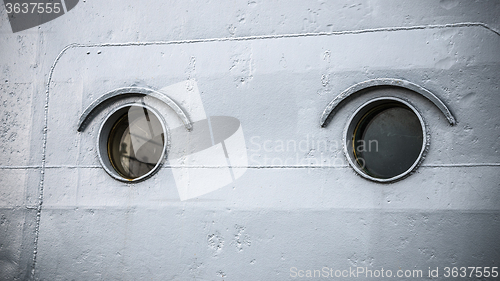 Image of Round portholes warship, close-up