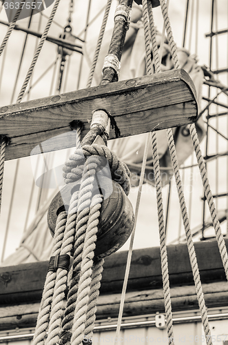 Image of Blocks and rigging of an old sailboat, close-up  