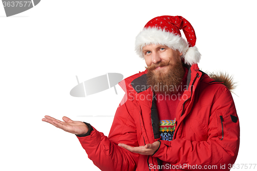 Image of bright picture of handsome man in christmas hat.